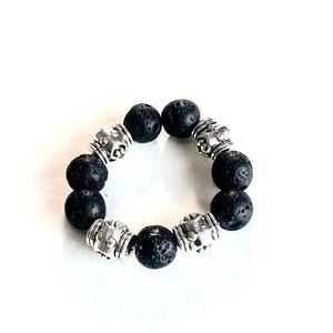 Women’s black and silver ring